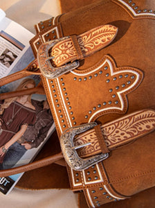 Brown buckle purse with tooled accent Montana west