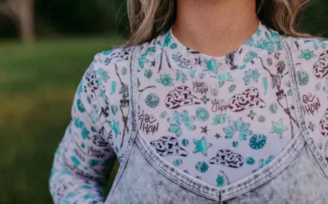 Ivory with turquoise, cow print & skeleton mesh top