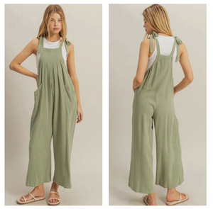 Sage green linen overalls with bow tie strap