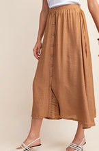 Load image into Gallery viewer, Saddle brown linen flowy maxi skirt with button accent
