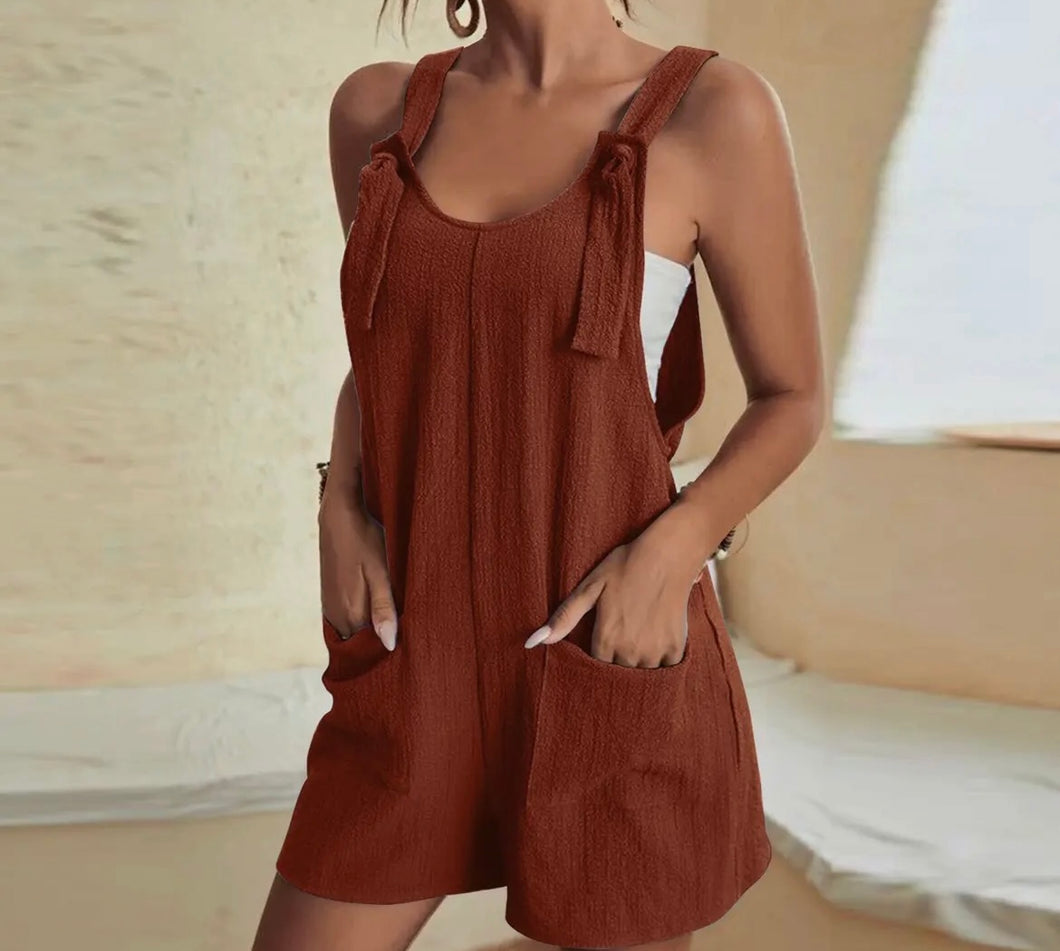 Rust romper with bow tie straps