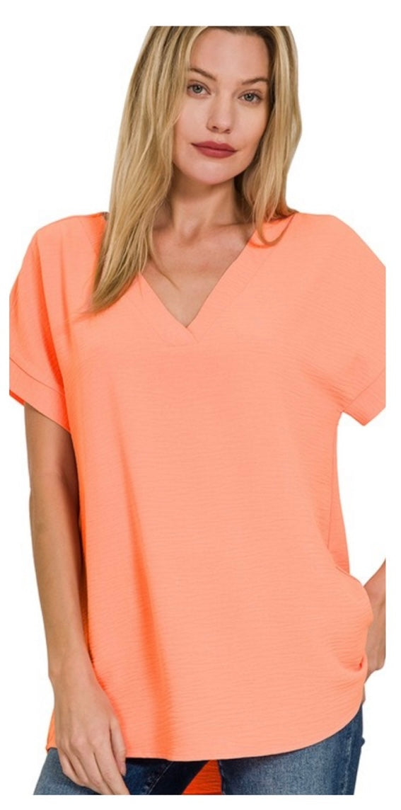 Bright coral short sleeve v neck top