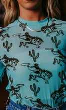 Load image into Gallery viewer, Teal with brown bucking horse &amp; cactus mesh long sleeve top
