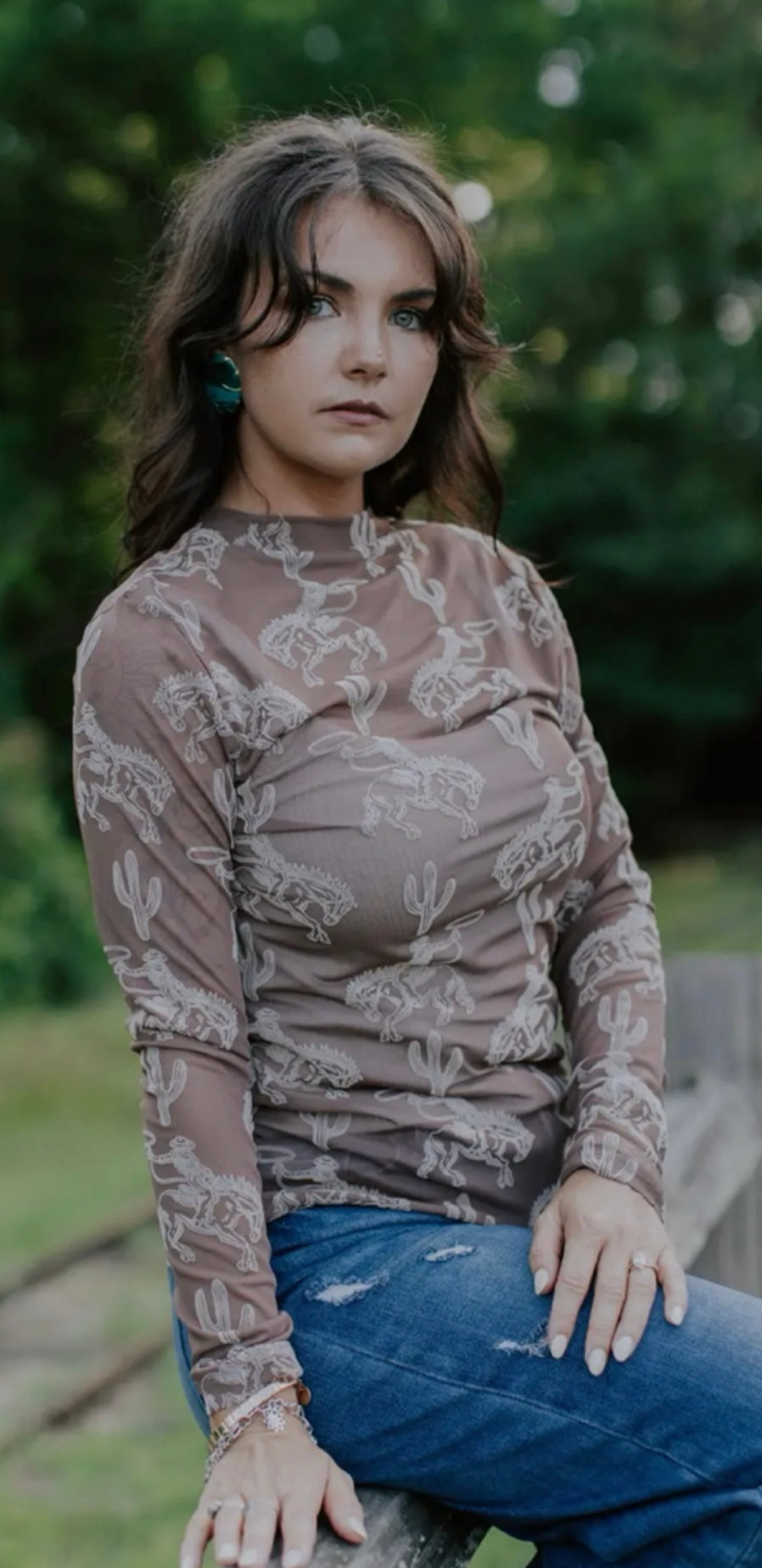 Brown with tan bucking horse & cactus mesh top