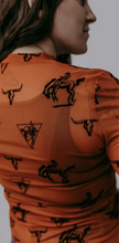 Load image into Gallery viewer, Rust with black velvet overlay mesh long sleeve top
