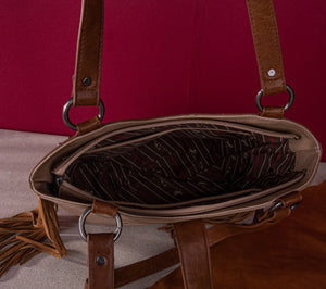 Tan, pink & saddle brown boot stitch embroidered fringe purse by Montana west
