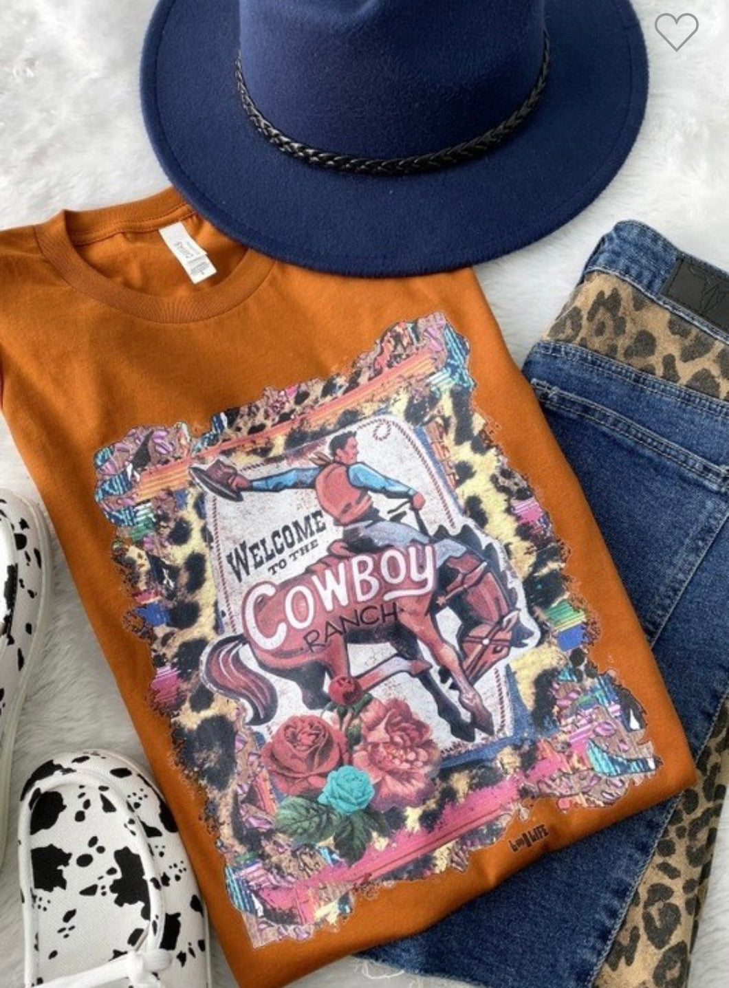 Rust vintage cowboy with cheetah t-shirt