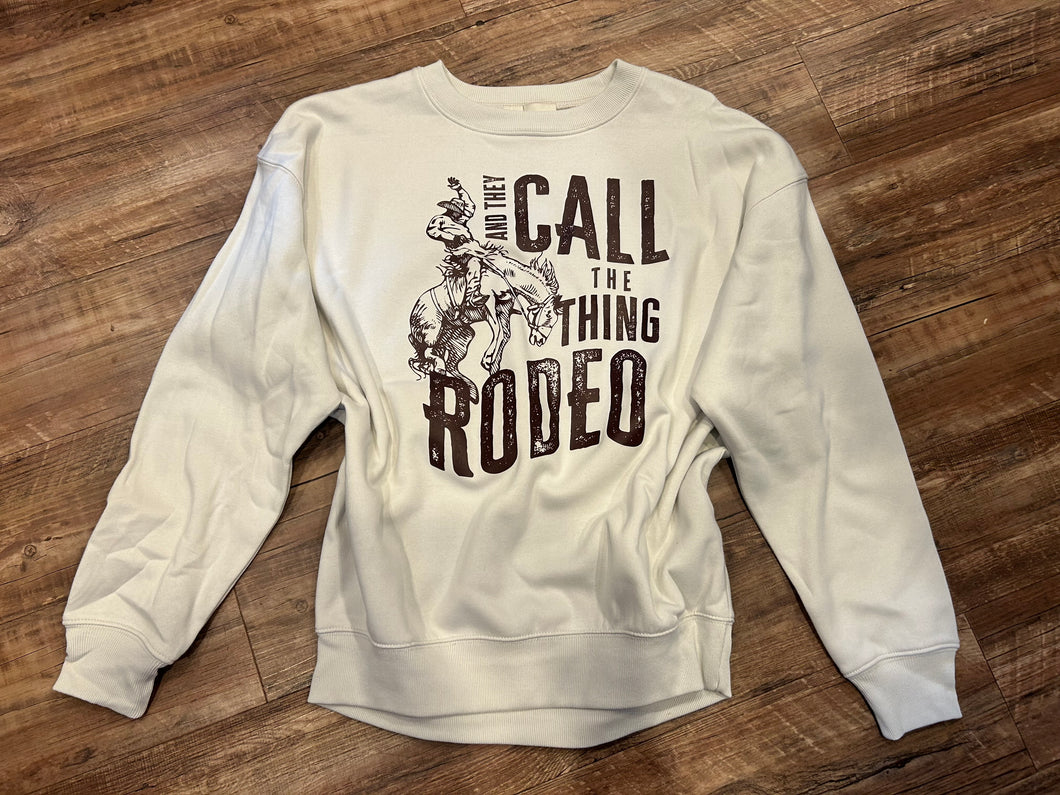 Cream and they call the thing a rodeo crewneck